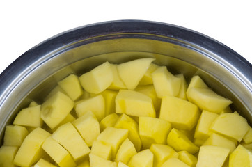 Cut peeled raw potato in the water. Top view