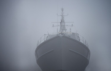 Ghost ship. Warship in the fog or mist as a flying Dutchman. Gray color. Mystery concept. Pirate...