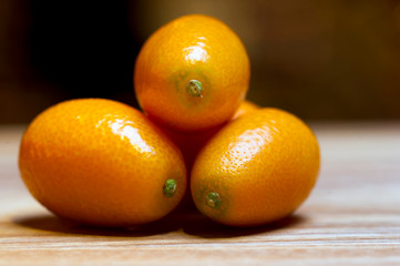 sale of exotic kumquat fruits (Fortunella sp.), still life on the market