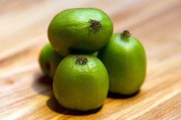 sale of exotic peelless kiwi fruits, still life on the market