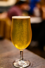 Misty glass with pint of cold Scotch ale, pale ale draft beer in English pub