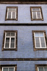 Old colorful tiled facades in Porto city