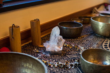 Tibetan singing bowls and a crystal