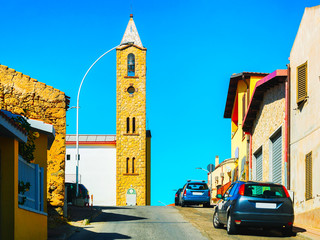 Street Cityscape of car road at Carbonia city at the Mediterranean Sea in South Sardinia in Italy....