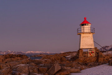 Amazing Sunset over the lighthouse in Lofoten islands, Norway.