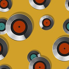 Seamless pattern with red and blue vinyl records on a yellow background.