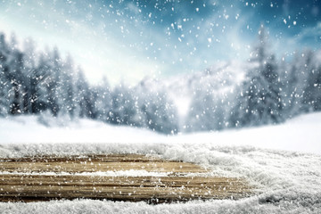 desk of free space and winter window background 