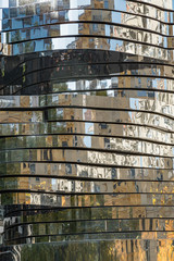 Chromed Metal background. Reflections over slices of shiny metal