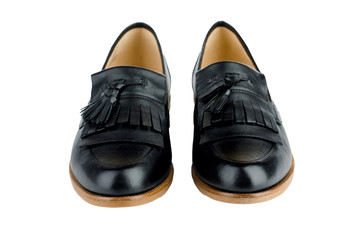 Women's black ballet flats on white background.