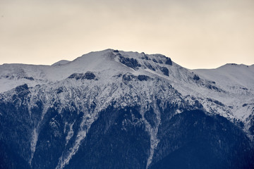 Fototapeta na wymiar Mountain range capped with snow