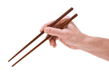 hand holding chopsticks isolated on white