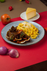 Spaghetti with huancaina with beef tenderloin