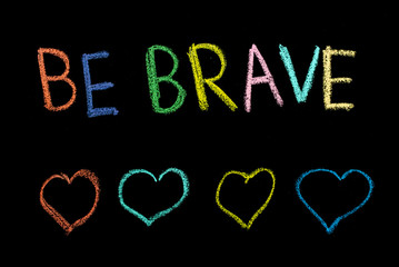 "be brave" drawn on chalkboard