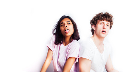 best friends teenage girl and boy together having fun, posing emotional on white background, couple happy smiling, lifestyle people concept, blond and brunette multi nations