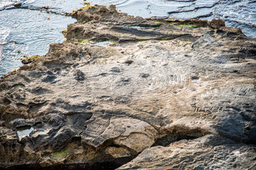 Engraved in the rock of an islet