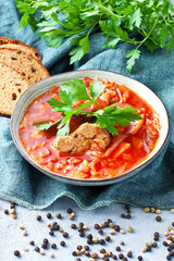 Traditional Russian and Ukrainian borscht soup with brown bread