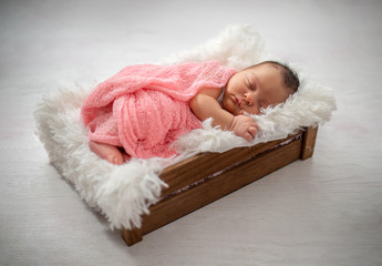 Obraz premium Top view image of a newborn baby sleeping