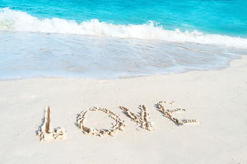 Love on the sea sand. Love concept for Valentine Day.