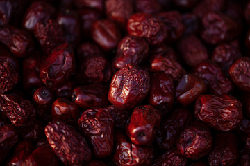 Date fruit isolated on dark background