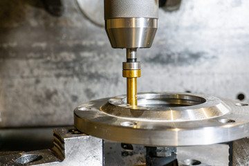 Milling a flange with holes on a cnc machine.