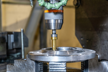 Milling a flange with holes on a cnc machine.