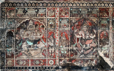 Colored ancient frescos the describing historical events, on a ceiling in the temple complex of...