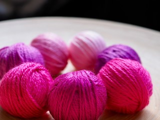 round balls of colourful yarn 