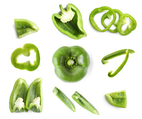 Set of cut ripe green bell peppers on white background