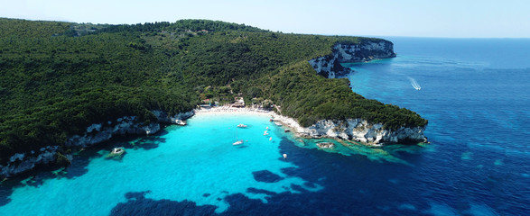 Aerial drone ultra wide photo of paradise sandy beaches in popular summer destination - island of Antipaxos with turquoise clear sea, Ionian, Greece