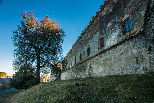Medzhybizh castle with sunset rays  in Khmelnytskyi Oblast, Ukraine