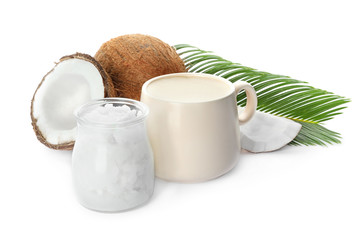 Delicious coffee with organic coconut oil and palm leaf isolated on white