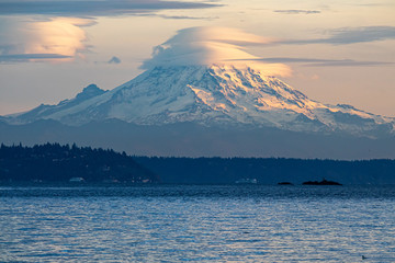 shoreline on bainbridge island with glow from the setting sun