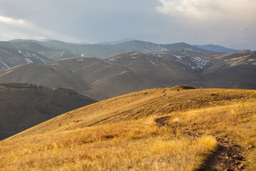 Fototapeta premium Winding Road in the Rolling Hills and Mountains