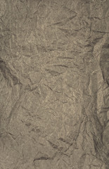 Crumpled paper background vignette. texture of crumpled  paper.