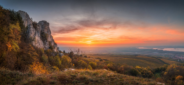 Colorful Autumn Sunset over Vineyards as Seen from Rocky Hill in Palava Protected Area near Mikulov in South Moravia, Czech Republic