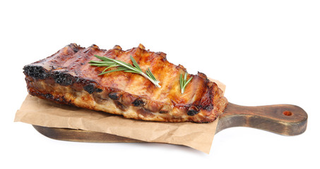Tasty grilled ribs with rosemary isolated on white
