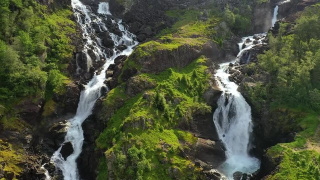 Latefossen is one of the most visited waterfalls in Norway and is located near Skare and Odda in the region Hordaland, Norway. Consists of two separate streams flowing down from the lake Lotevatnet.