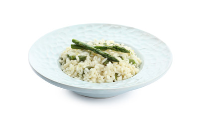 Delicious risotto with asparagus isolated on white