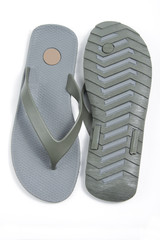 A pair of brown coffee sandals on a white isolated background