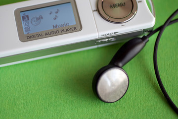 Digital audio player on green background