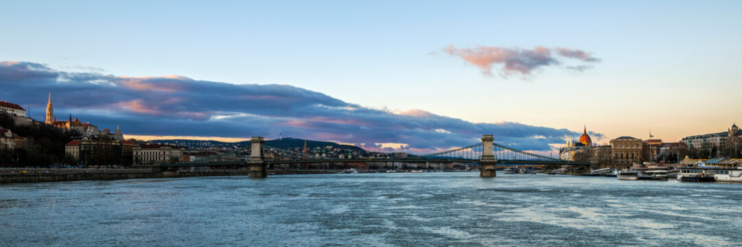 Panorama of Secheni Chain Bridge and the city of Budapest from the Danube River, Hungary.
