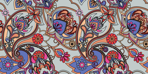 Decorative seamless pattern for fabric, tapestry, wallpaper and backgrounds in the style of a traditional oriental paisley pattern.
