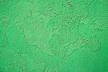 Rough subdued green background pattern.
