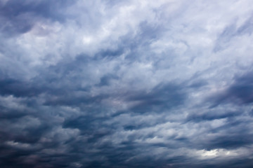 dramatic blue sky with white clouds