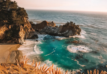 Rocky cliffside beach, beautiful blue water