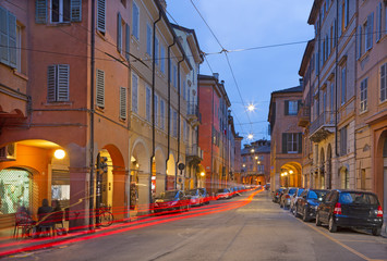 Fototapeta na wymiar Modena - Thethe street of old town at dusk.