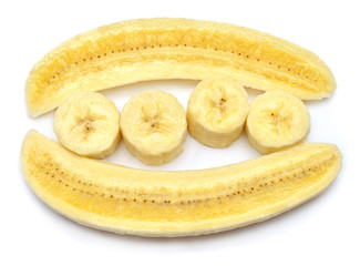 Banana slice and half isolated on white background. Perfectly retouched, full depth of field on the photo. Top view, flat lay