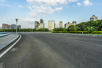 Fototapeta na wymiar urban traffic road with cityscape in background, China.