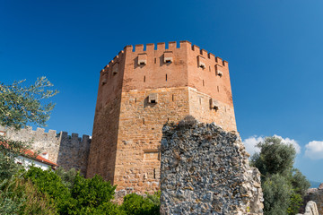 Fototapeta na wymiar Red tower or Kizil Kule in the ancient citadel Alanya Kalesi