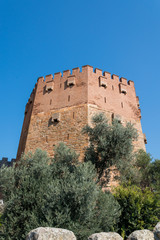 Fototapeta na wymiar Red tower or Kizil Kule in the ancient citadel Alanya Kalesi